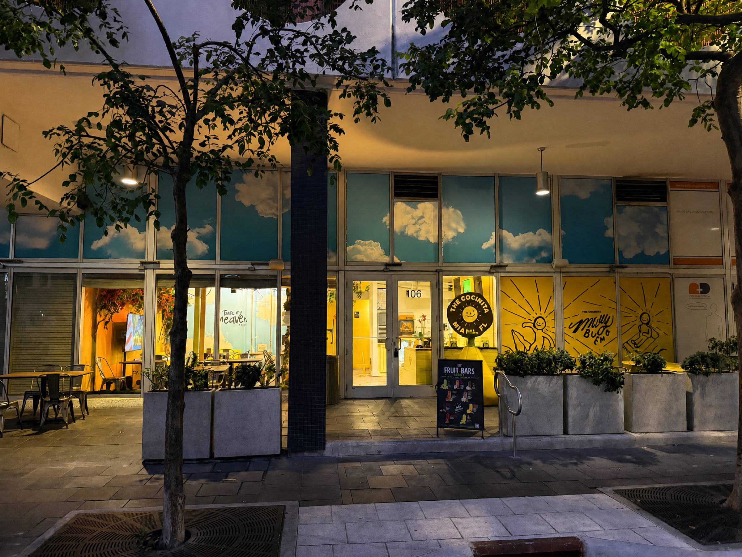 Restaurant facade lit up at night, The Cocinita Miami, Brickell