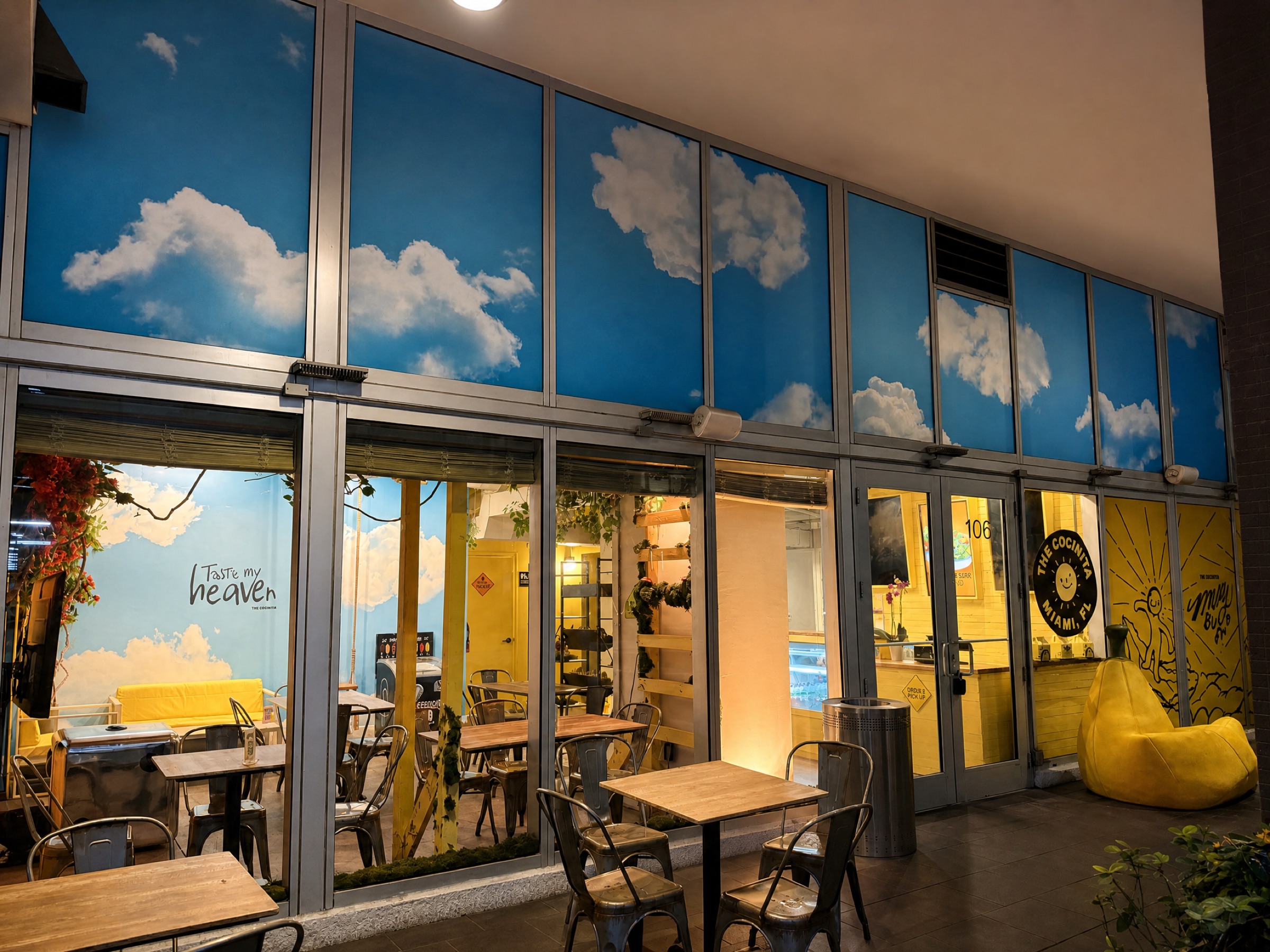 Outdoor patio beside the glass facade, The Cocinita Miami, Brickell